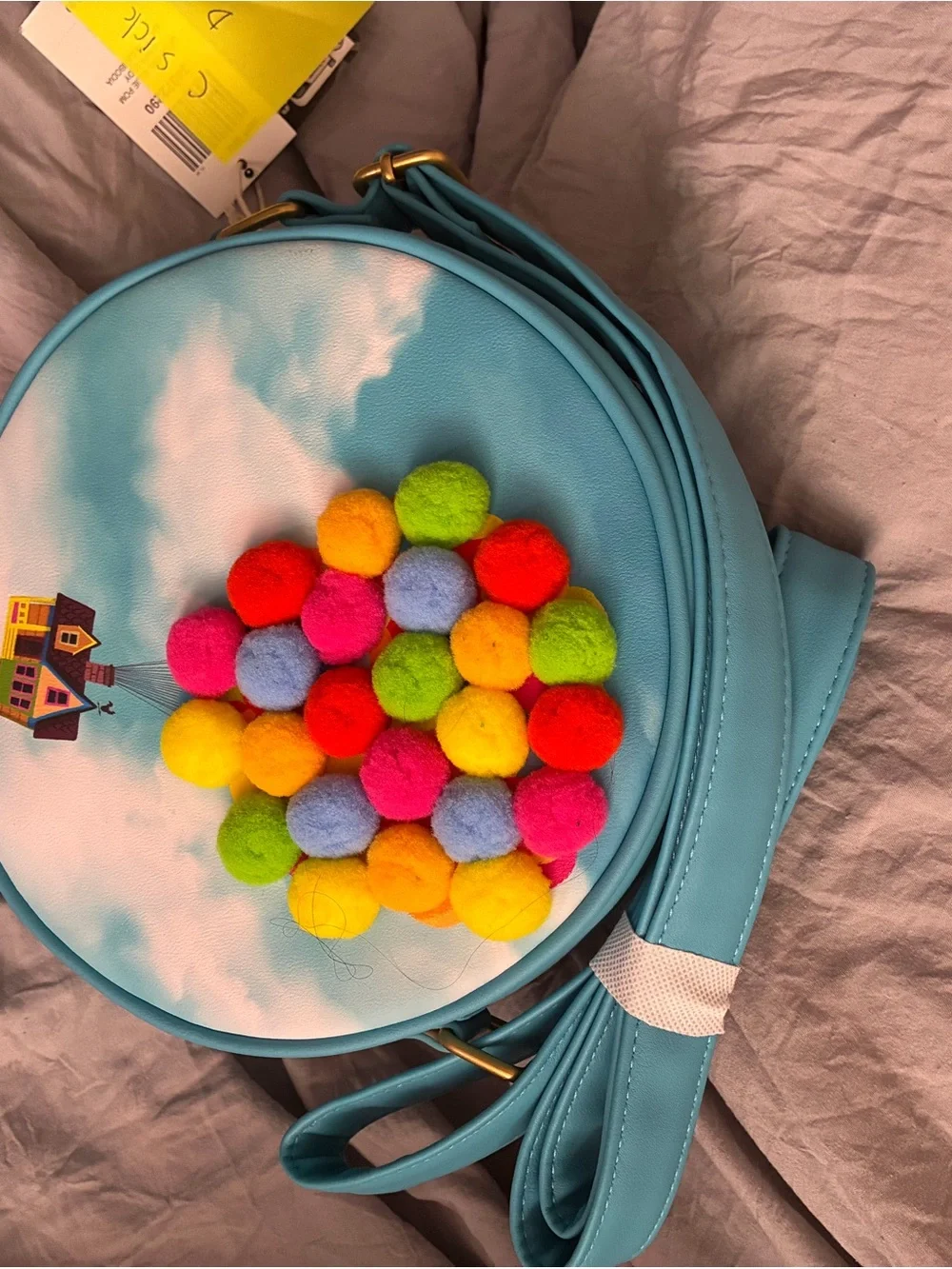 Loungefly Turquoise Round Crossbody with Multicolor Pom-Poms